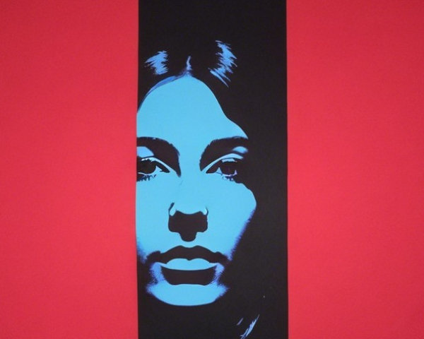 Bold Blue Portrait on Vivid Red Background