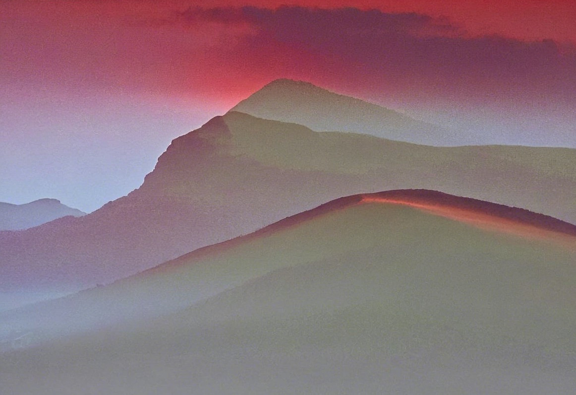 Breathtaking Landscape of Misty Mountains and Hills