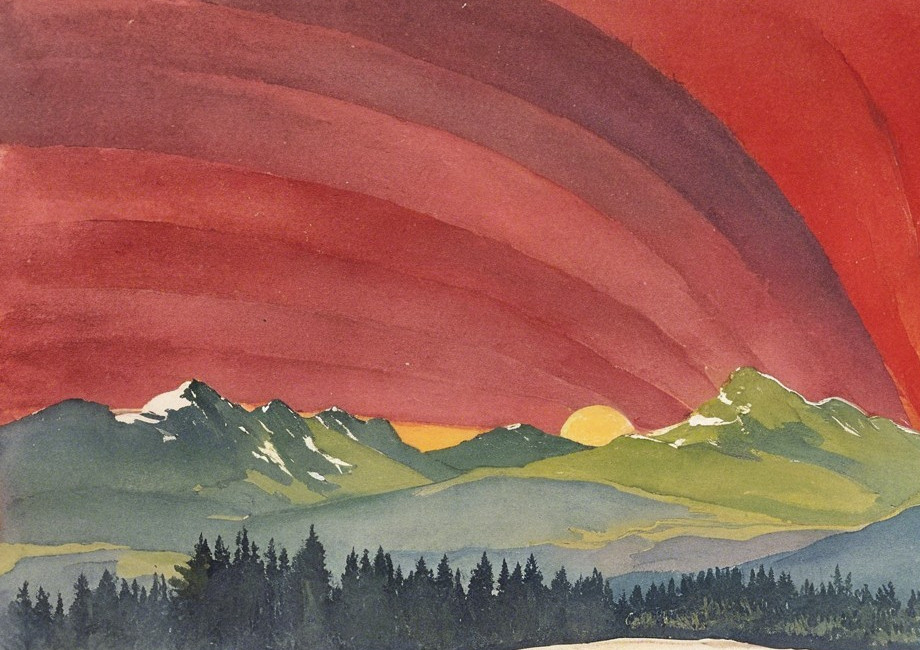 Majestic Mountains Under a Red Sky at Sunset