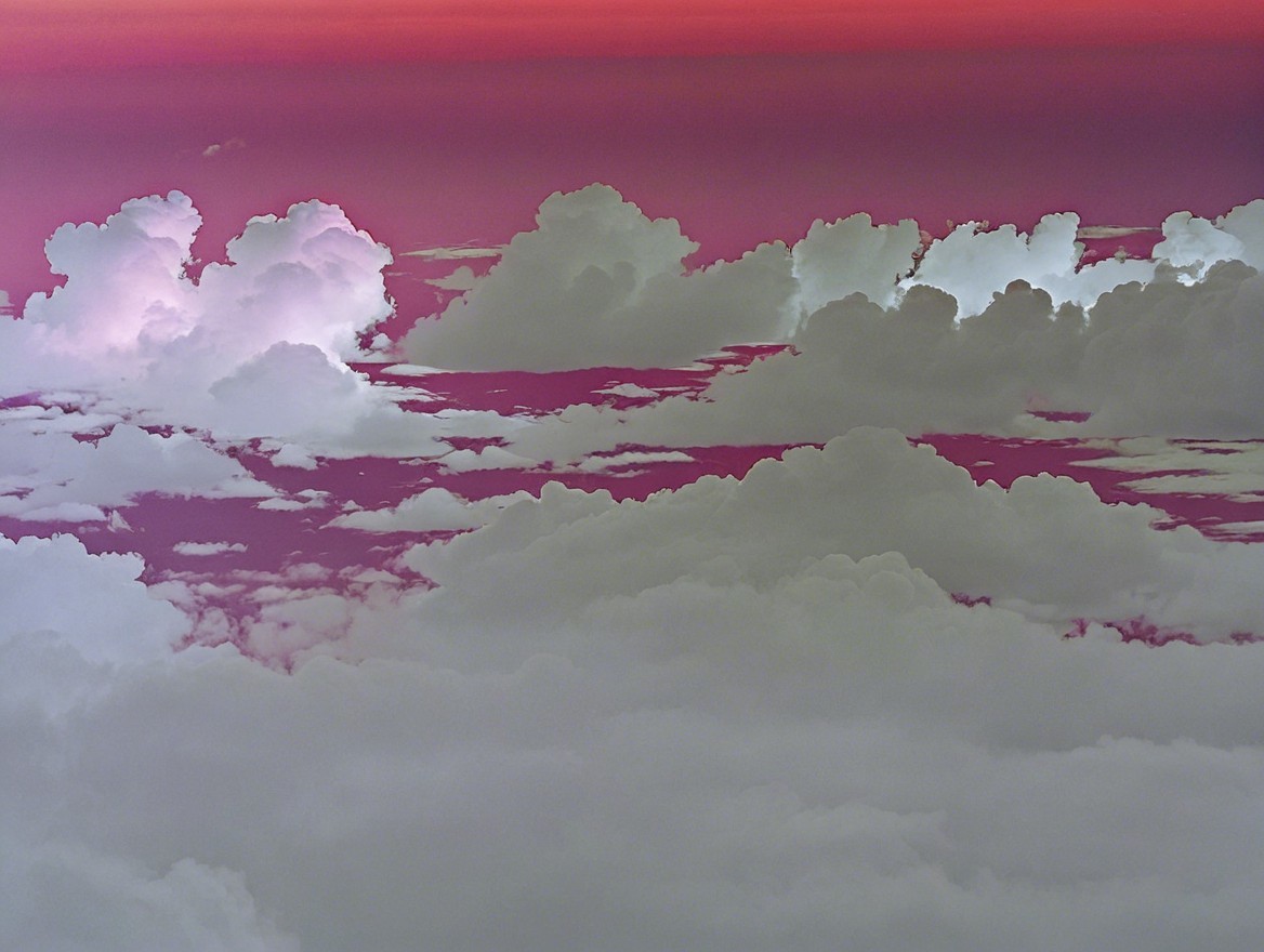 Billowing Clouds in Pink and Purple Sky