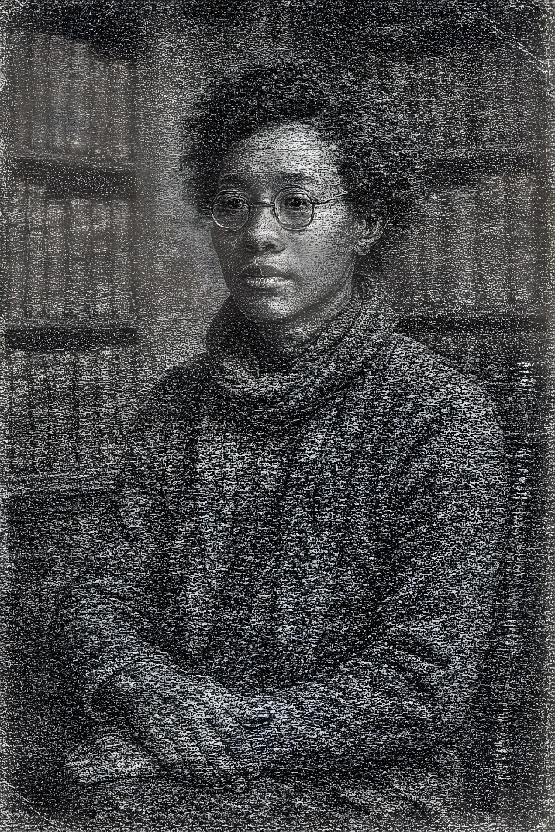 Person with Natural Hair in Cozy Sweater and Glasses
