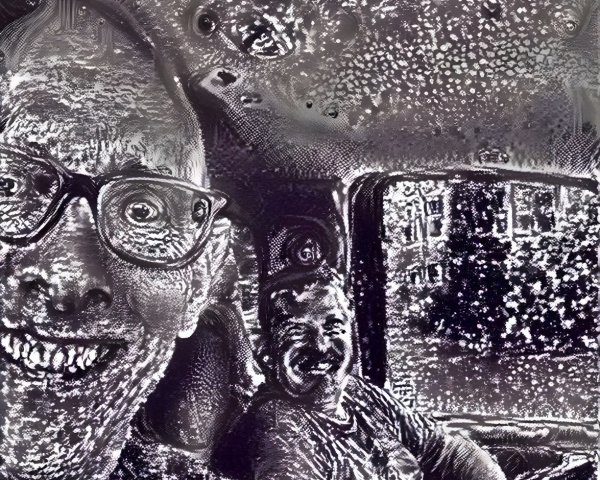 Two Men Inside a Vehicle with Rainy Window Background