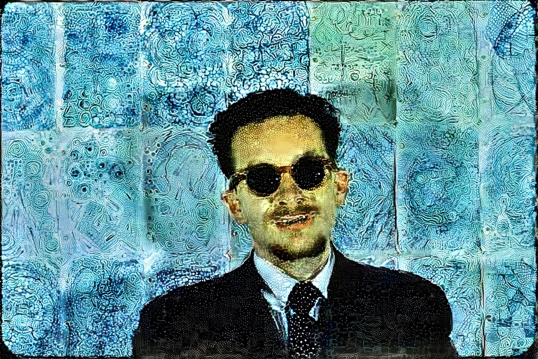 Man in Dark Suit with Abstract Blue Background