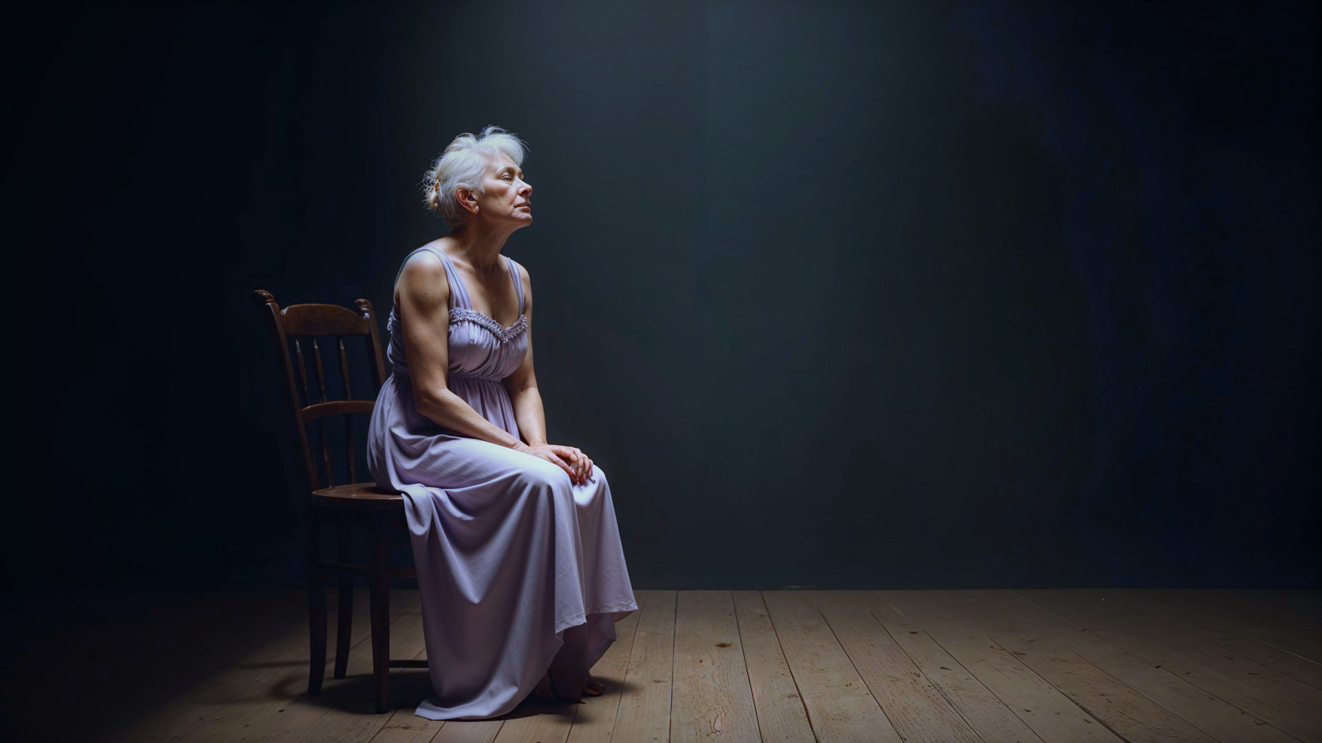 Contemplative Woman in Lavender Gown in Soft Light