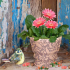 Colorful Bird and Pink Flower Pot in Rustic Setting