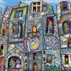 Colorful Facade of Houses with Whimsical Figures